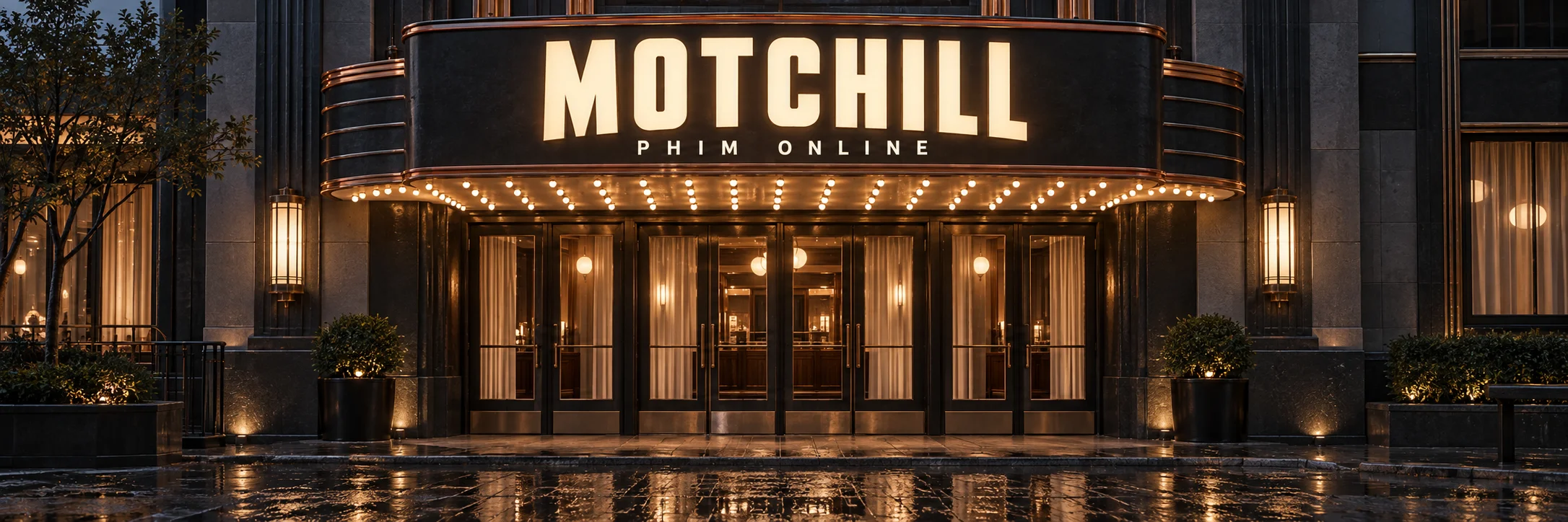 Rạp phim với bảng hiệu MOTCHILL PHIM ONLINE màu kem trên nền than
